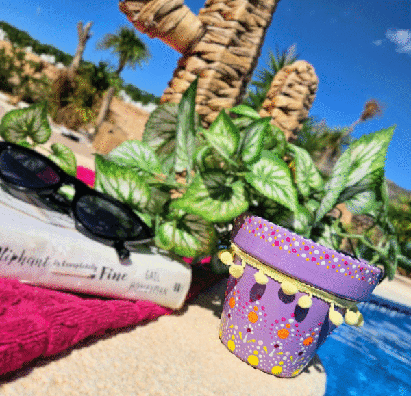 Decorative dotted plant-pot.