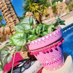 Decorative dotted plant-pot.