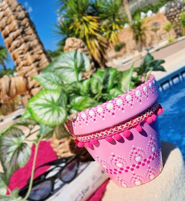 Decorative dotted plant-pot.