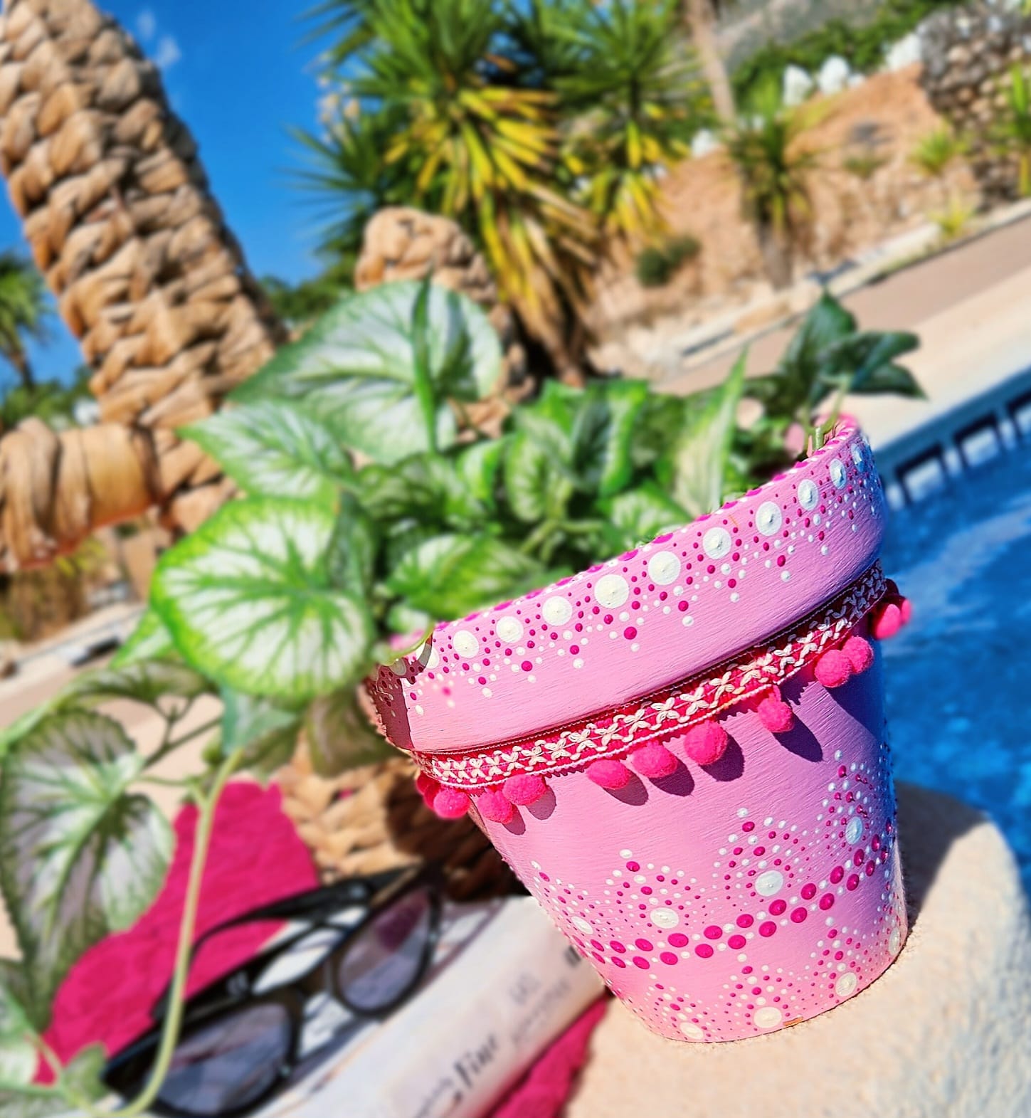 Decorative dotted plant-pot.