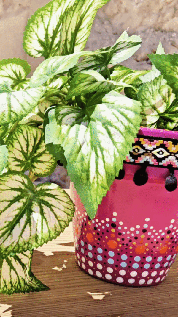 Decorative dotted plant-pot.