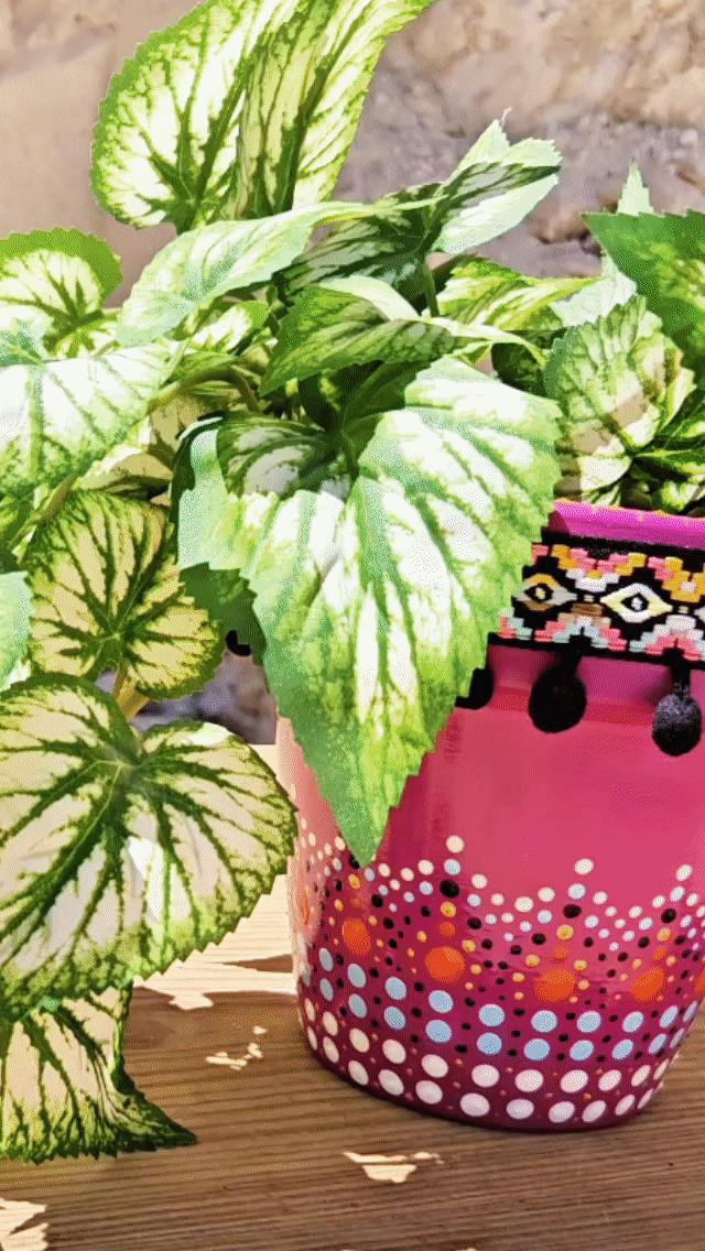 Decorative dotted plant-pot.