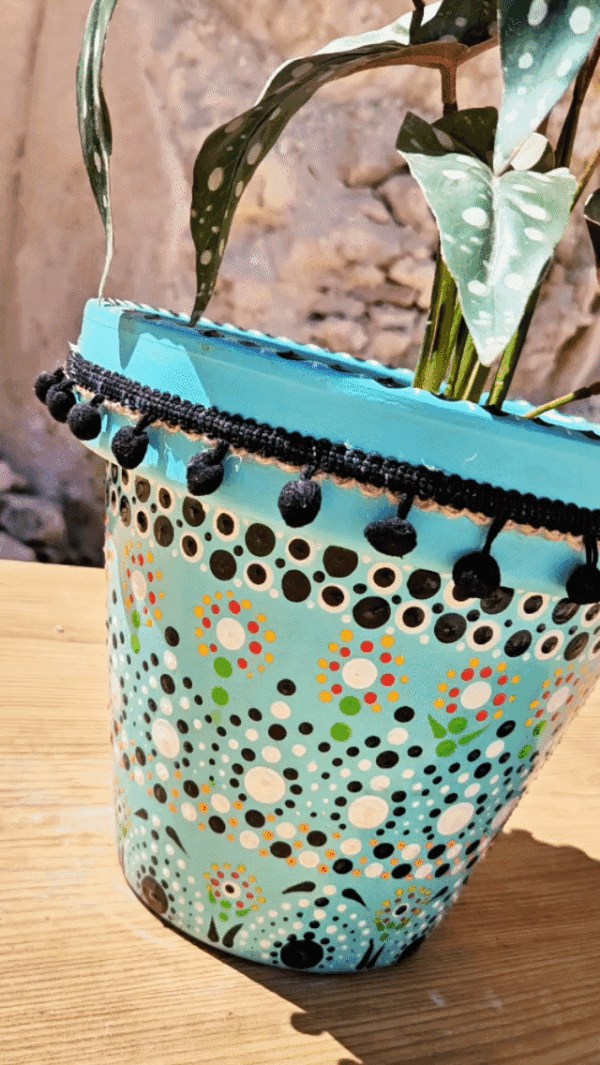 Decorative dotted plant-pot.