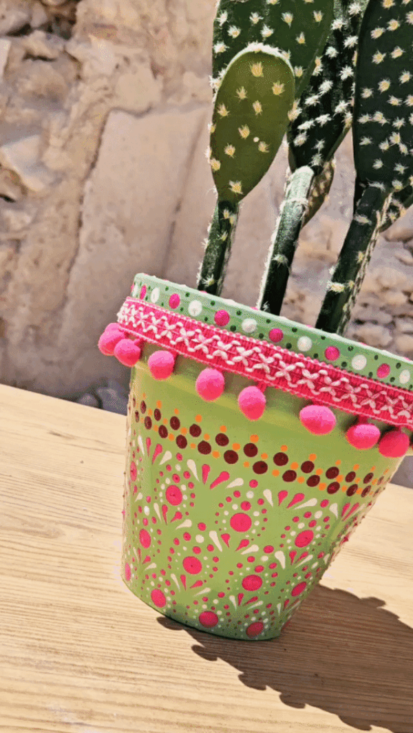 Decorative dotted plant-pot.