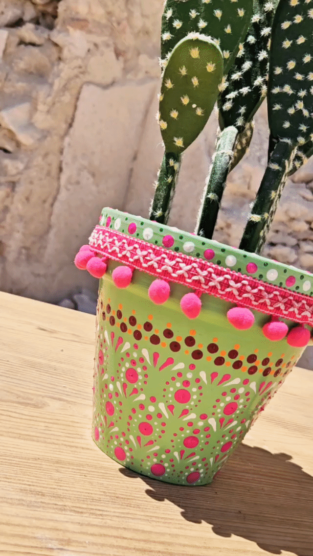 Decorative dotted plant-pot.