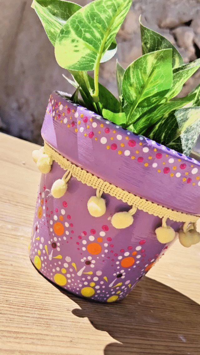 Decorative dotted plant-pot.