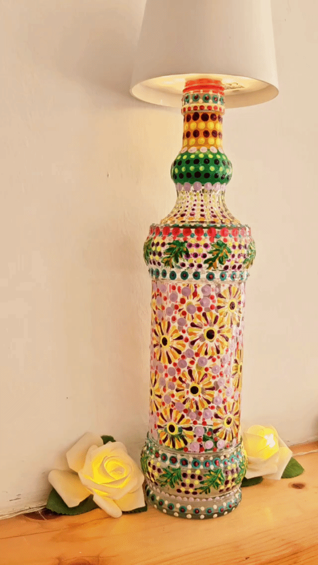 Decorative dotted bottle lamp.