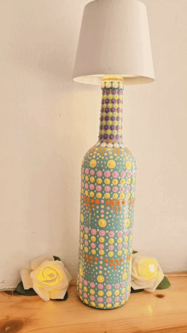 Decorative dotted bottle lamp.