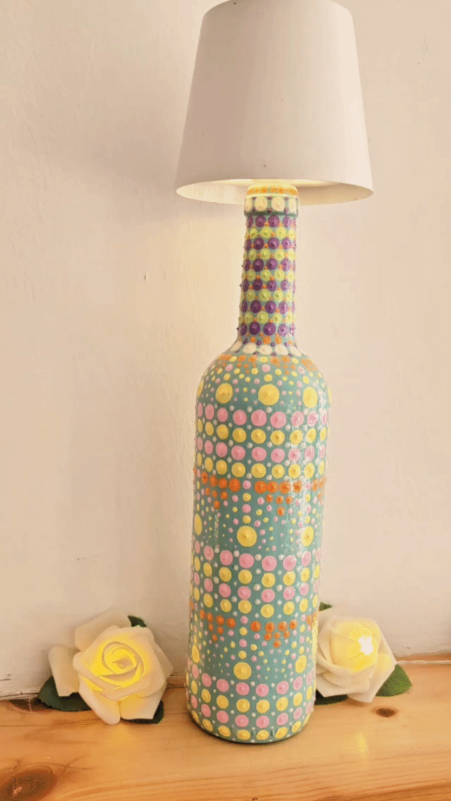 Decorative dotted bottle lamp.
