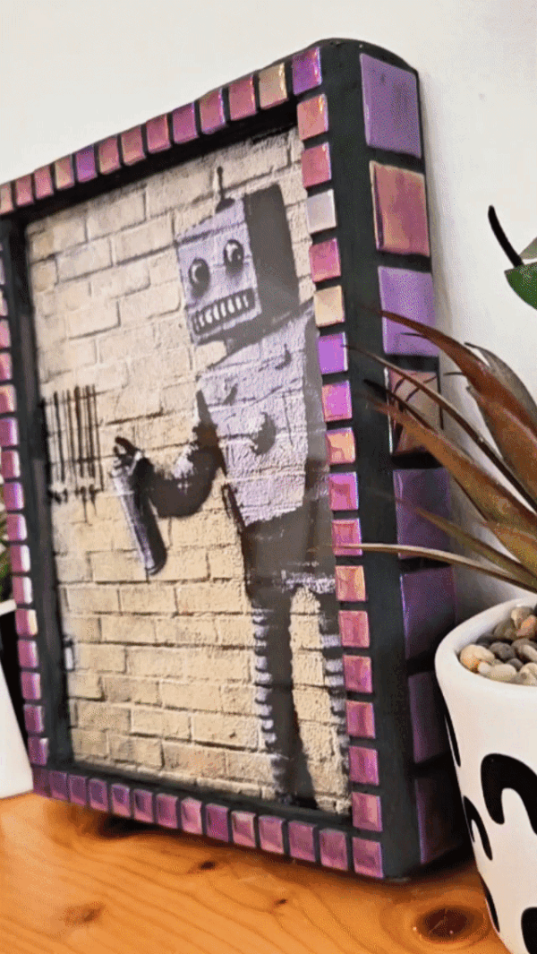 Iridescent mosaic photo-frame.