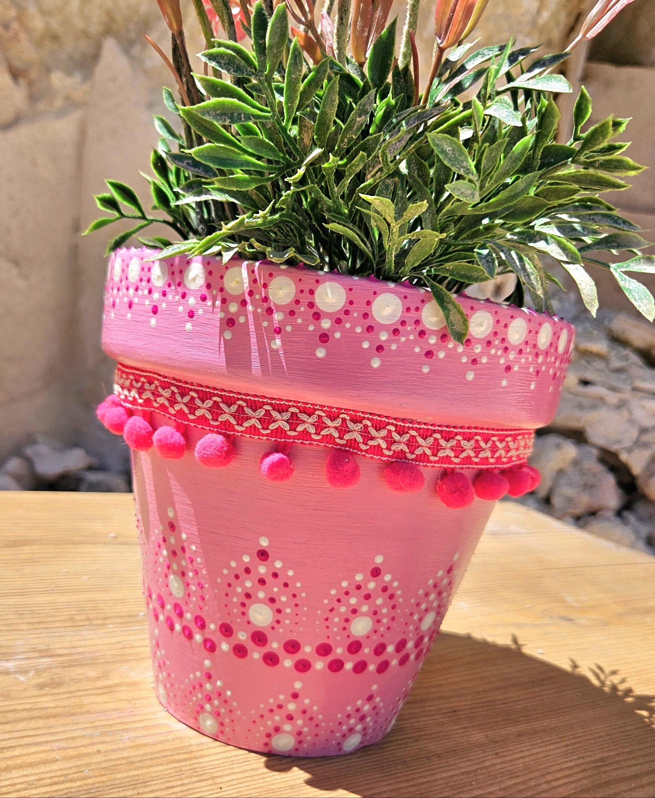 Decorative dotted plant-pot.
