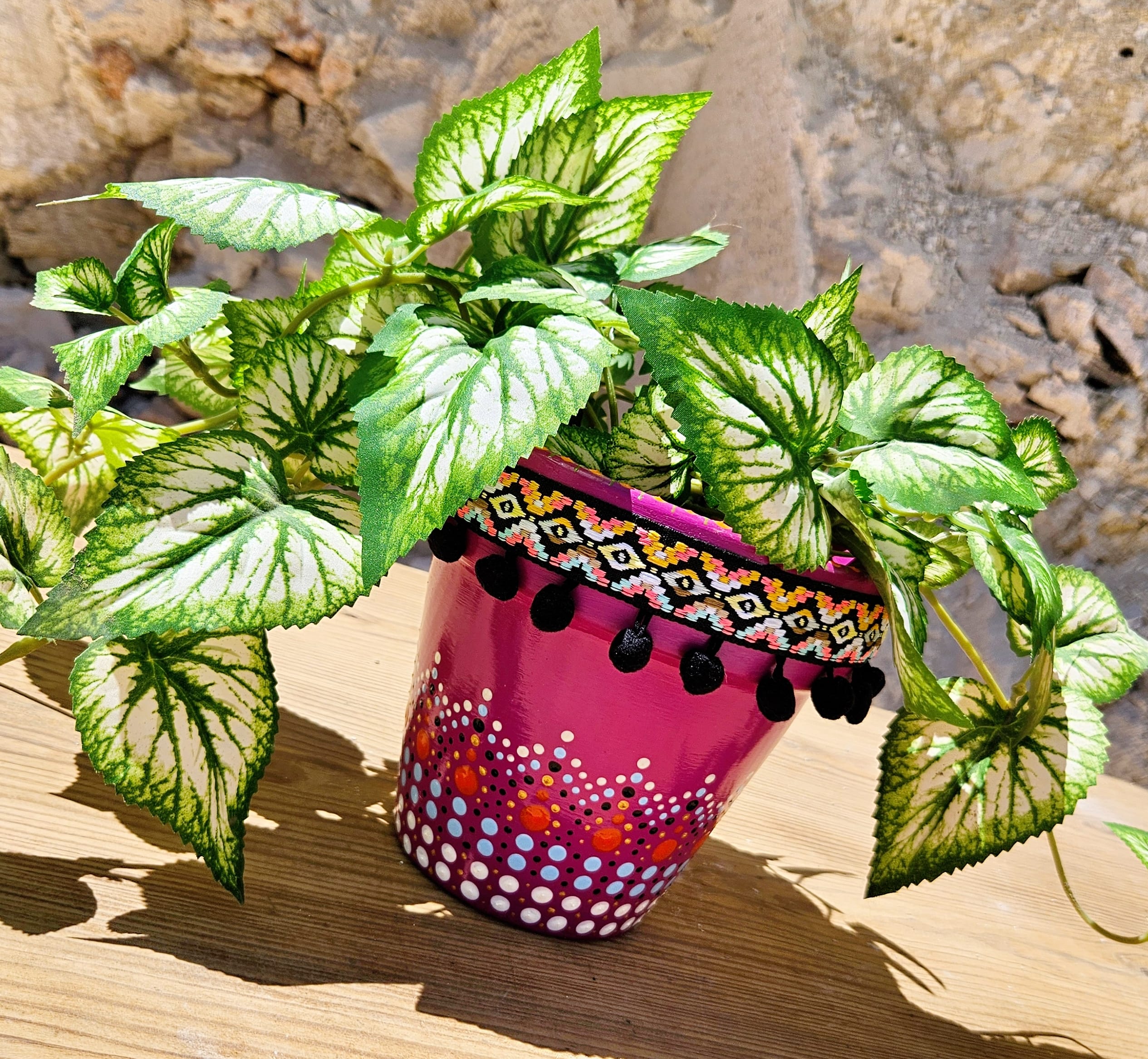Decorative dotted plant-pot.