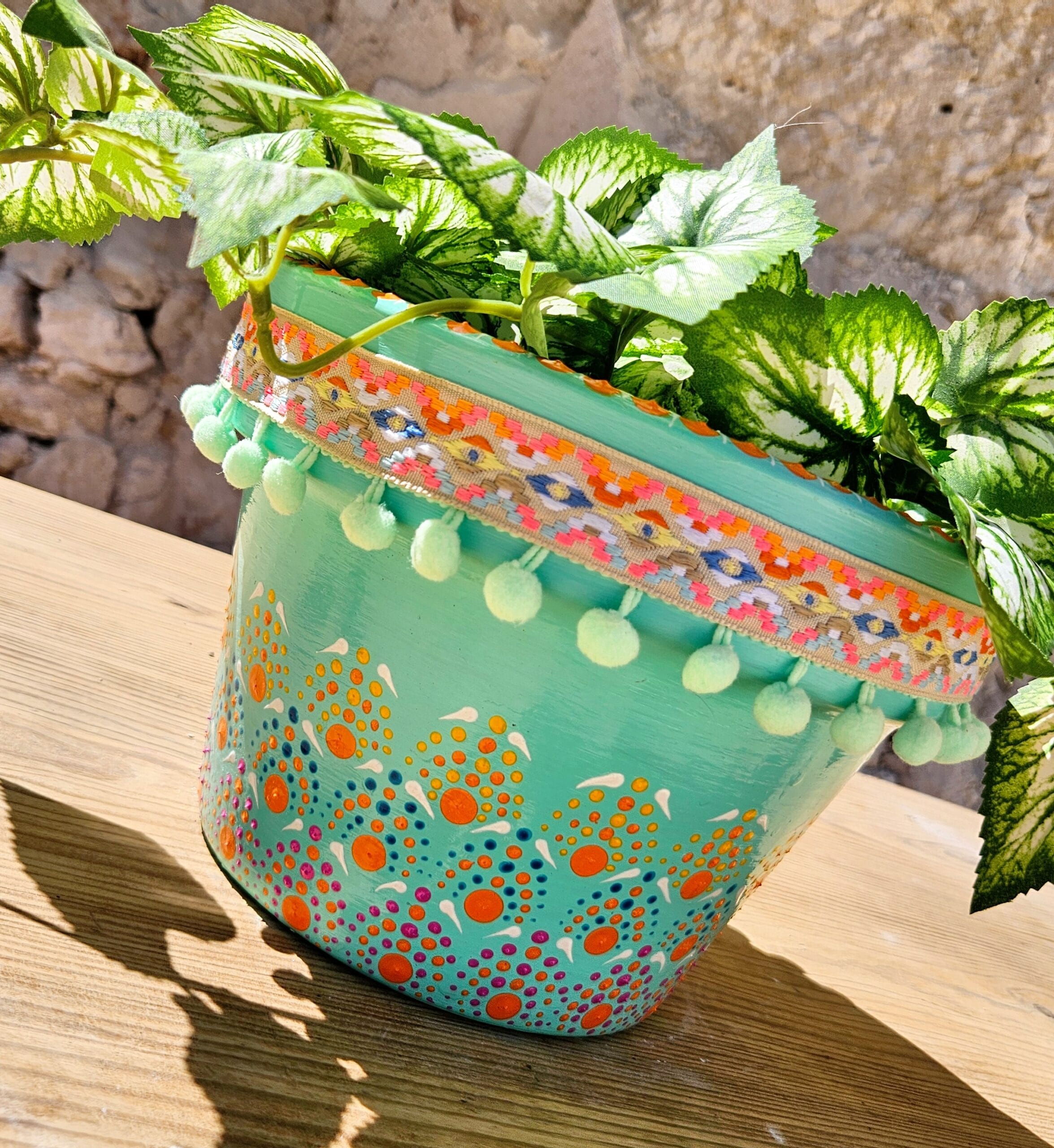 Decorative dotted plant-pot.