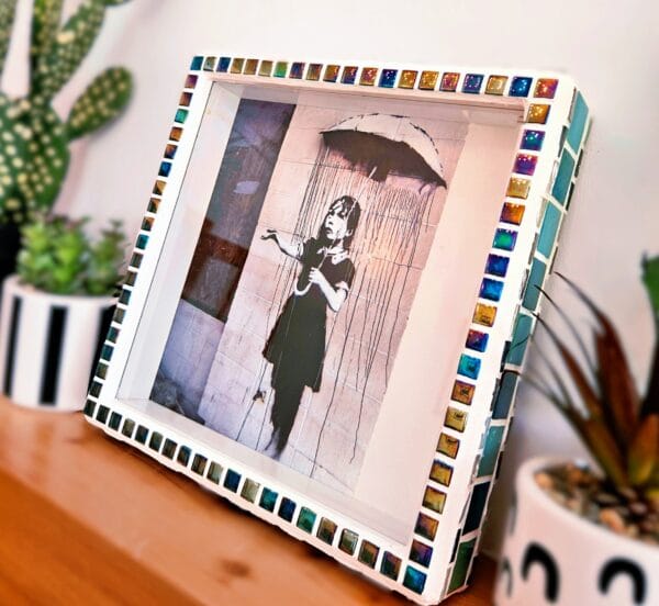 Iridescent mosaic photo-frame.