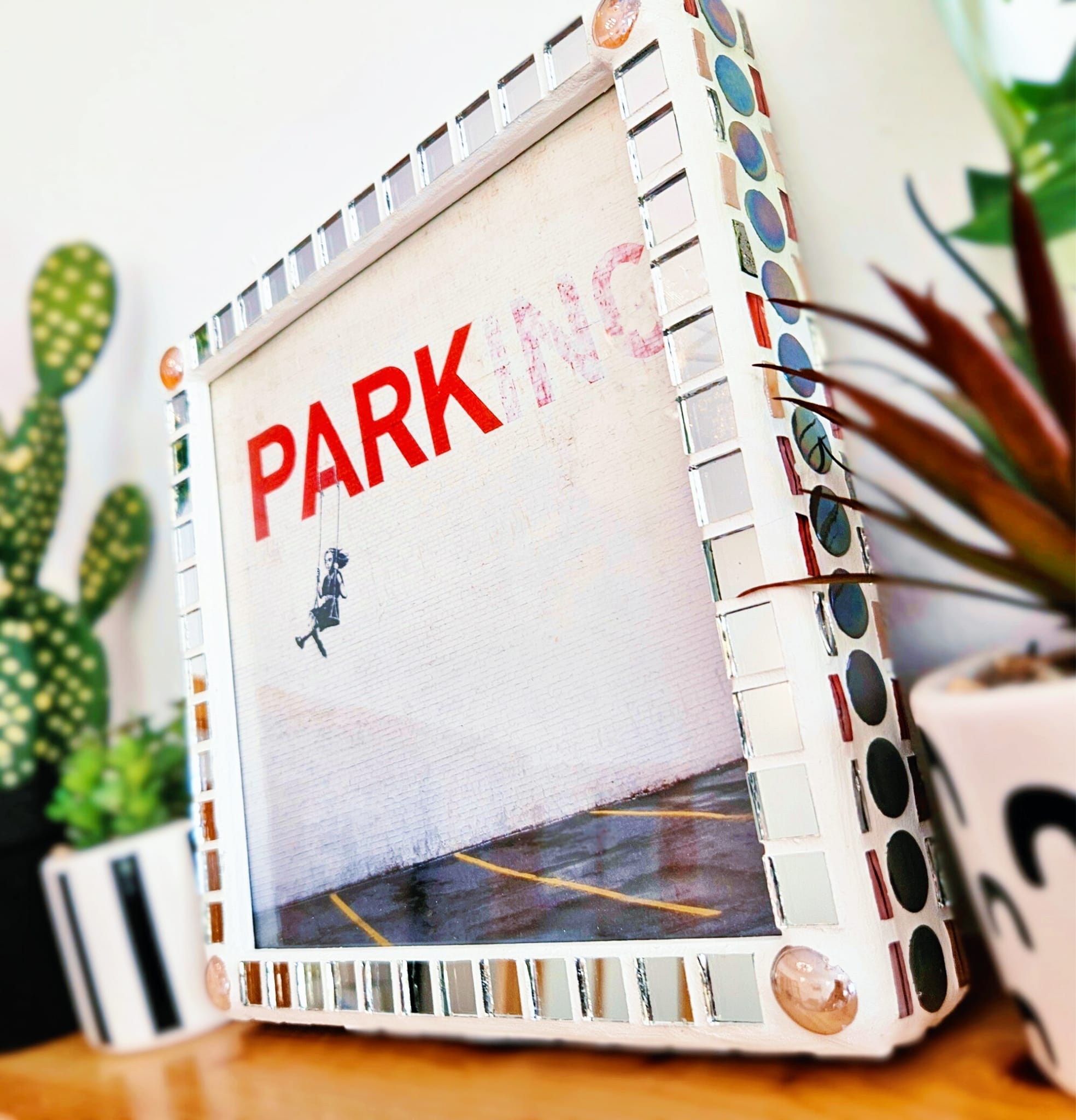 Iridescent mosaic photo-frame.