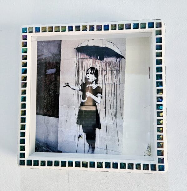 Iridescent mosaic photo-frame.