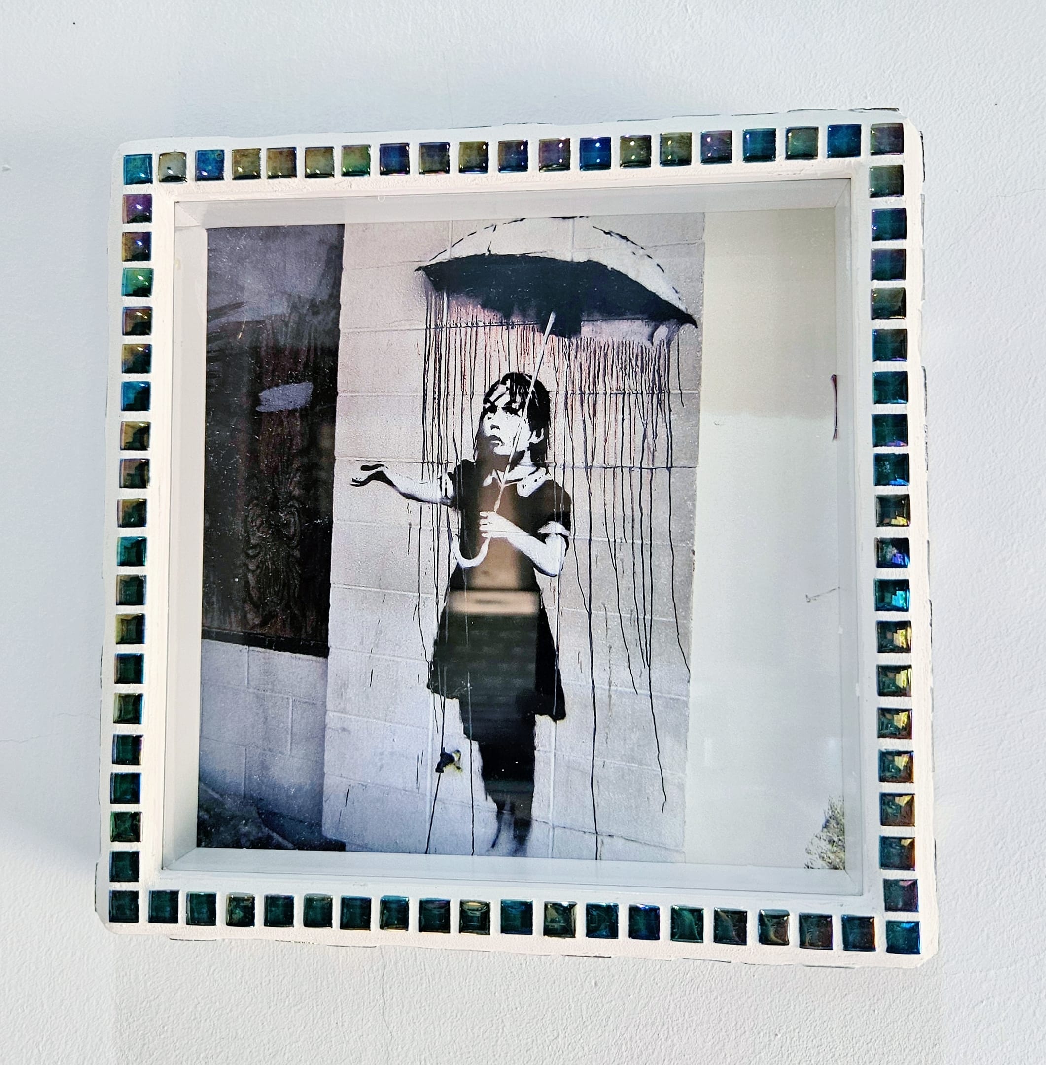 Iridescent mosaic photo-frame.