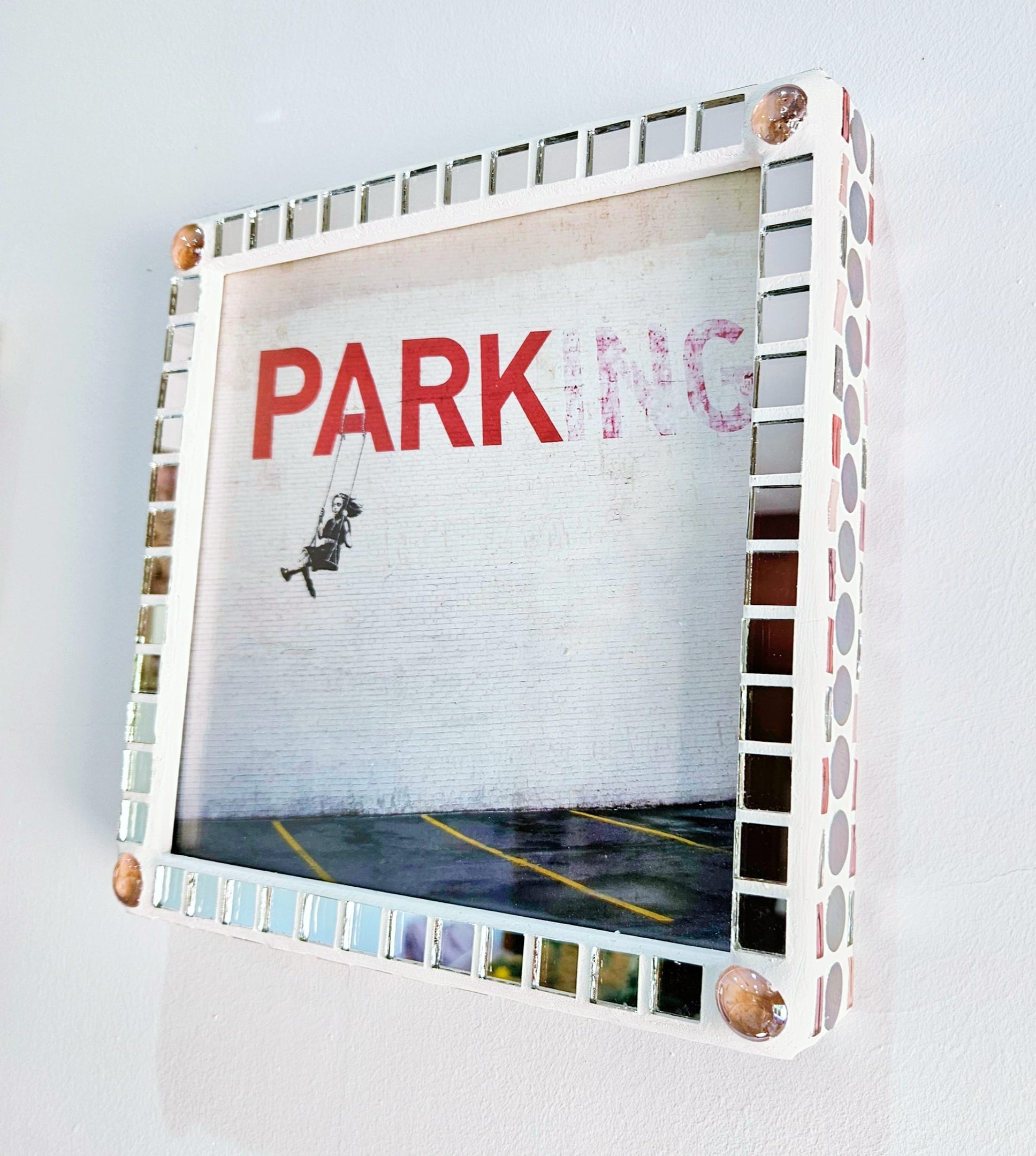 Iridescent mosaic photo-frame.