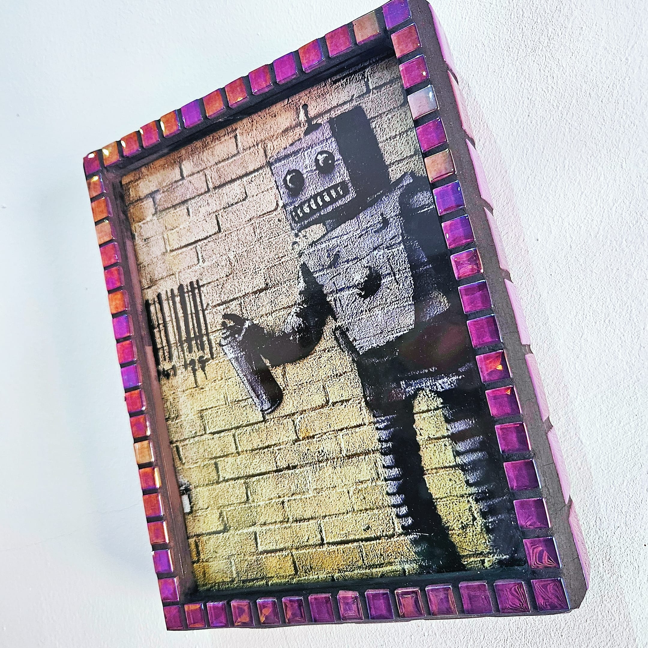 Iridescent mosaic photo-frame.