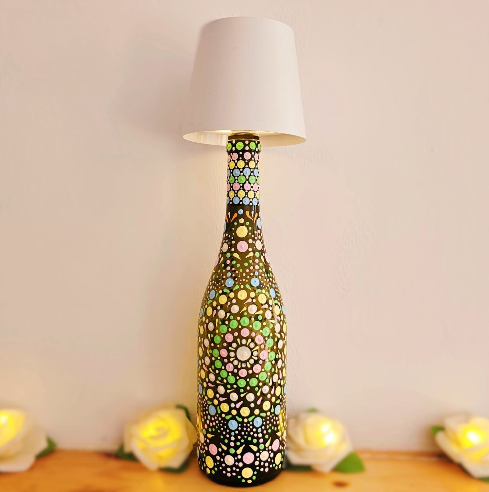 Decorative dotted bottle lamp.