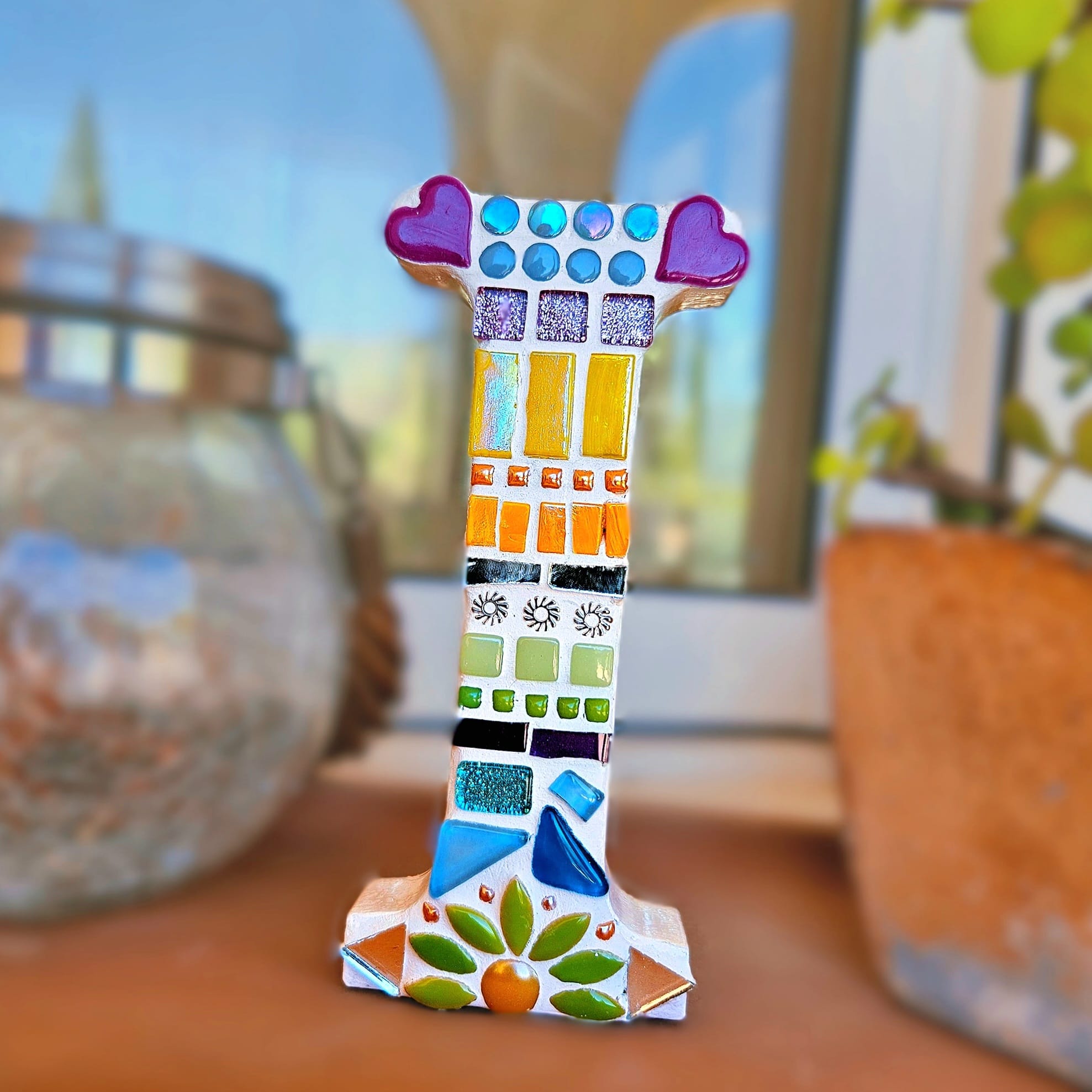 Decorative mosaic letter I.