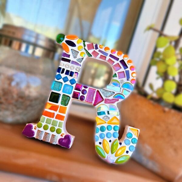 Decorative mosaic letter R.