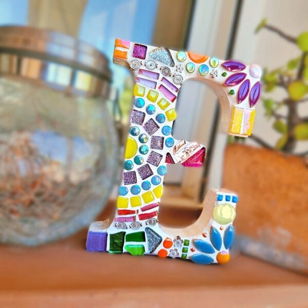 Decorative mosaic letter E.