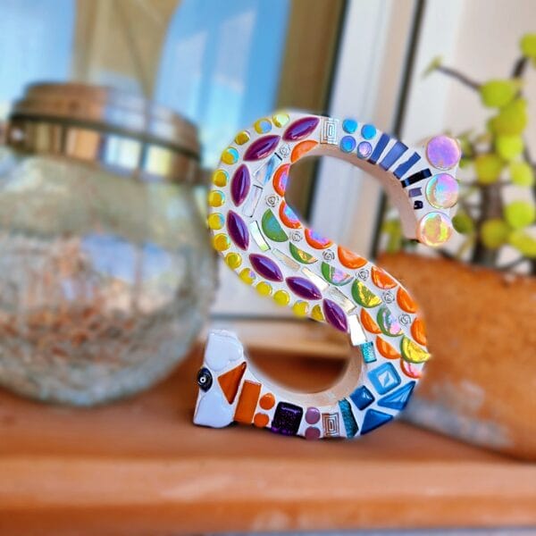 Decorative mosaic letter S.