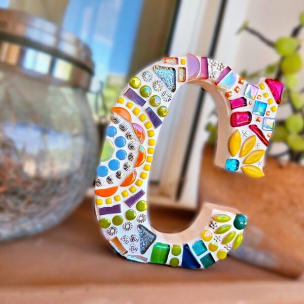 Decorative mosaic letter C.