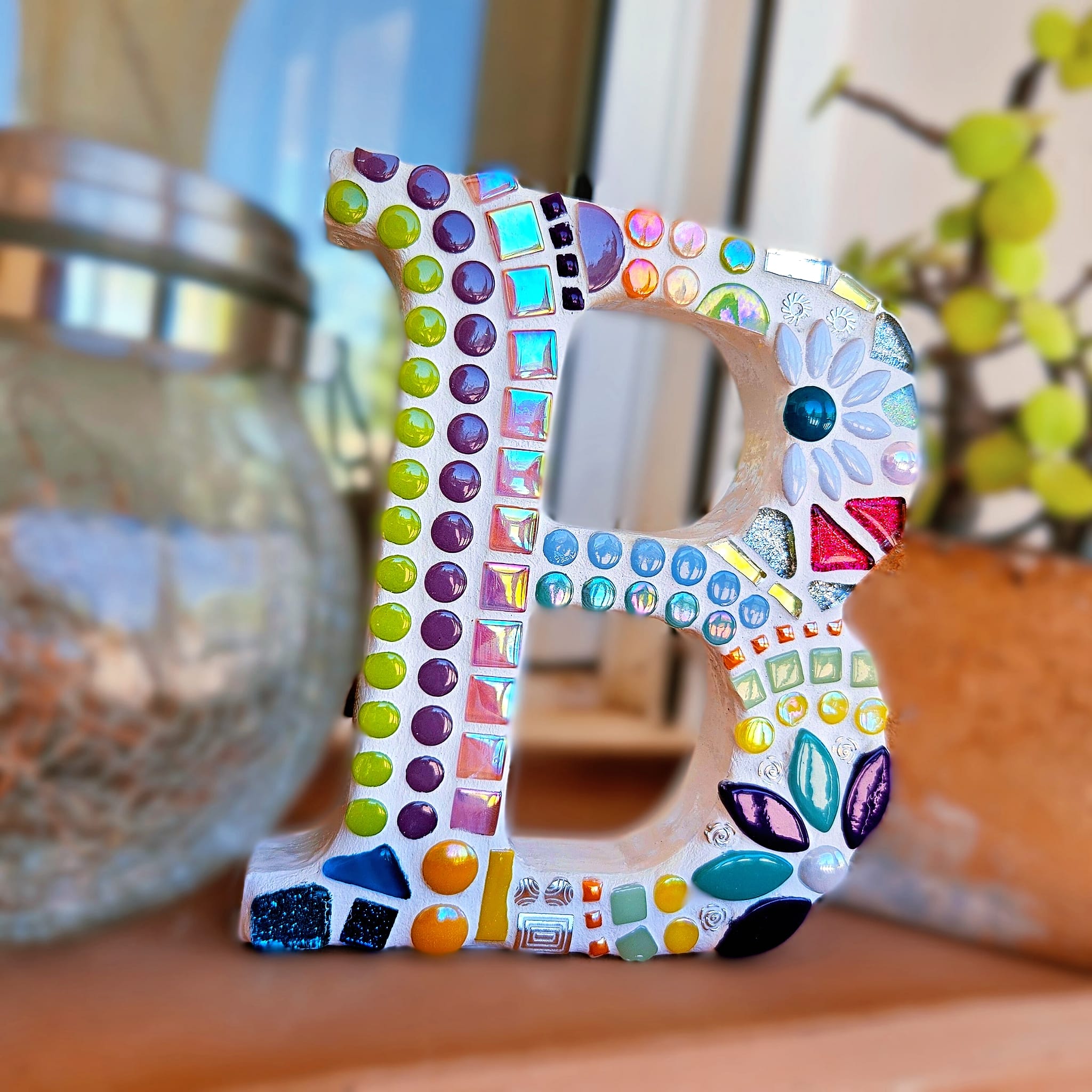 Decorative mosaic letter B.