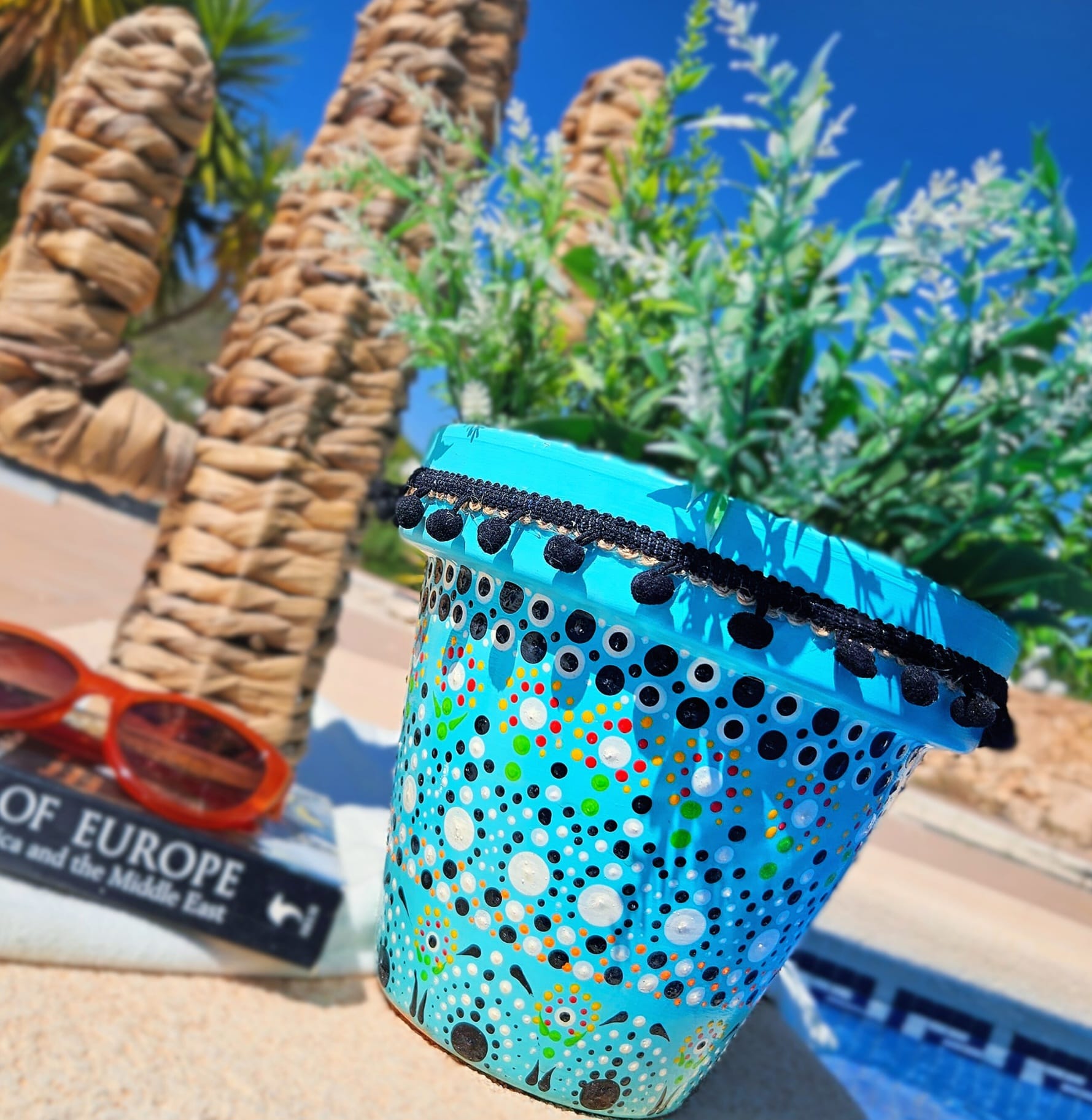 Decorative dotted plant-pot.