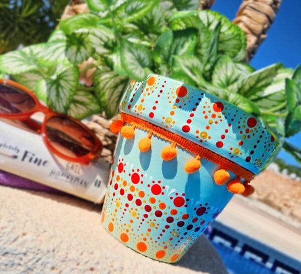 Decorative dotted plant-pot.