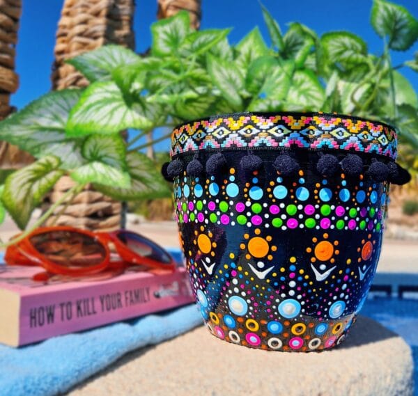 Decorative dotted plant-pot.