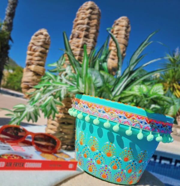 Decorative dotted plant-pot.