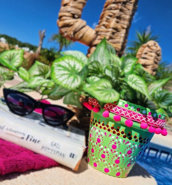 Decorative dotted plant-pot.