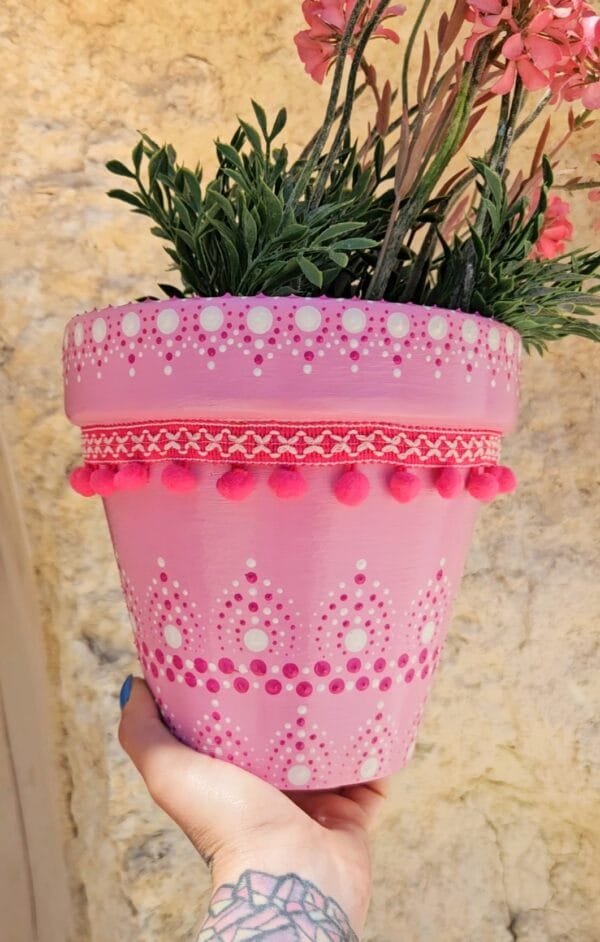 Decorative dotted plant-pot.