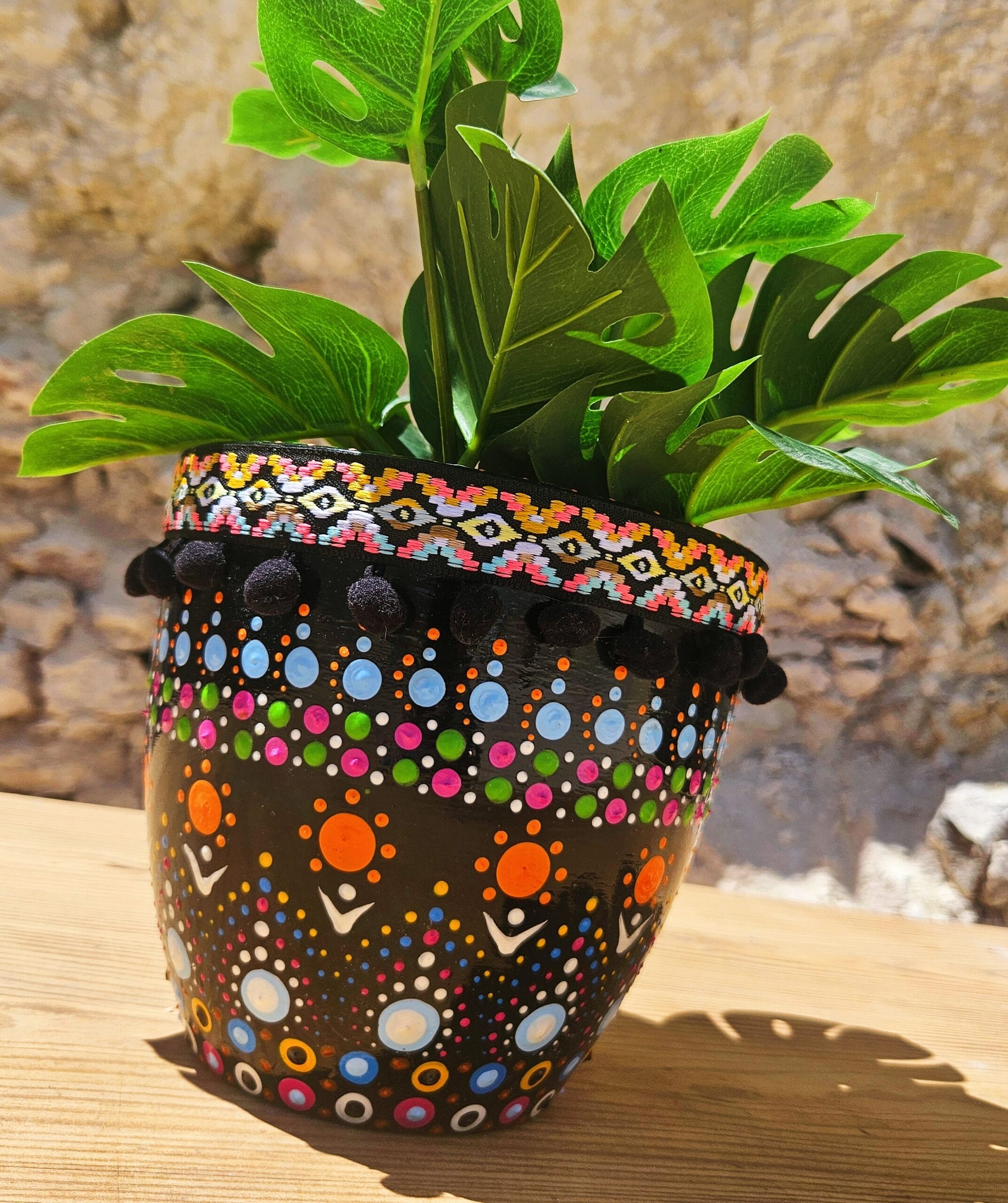Decorative dotted plant-pot.