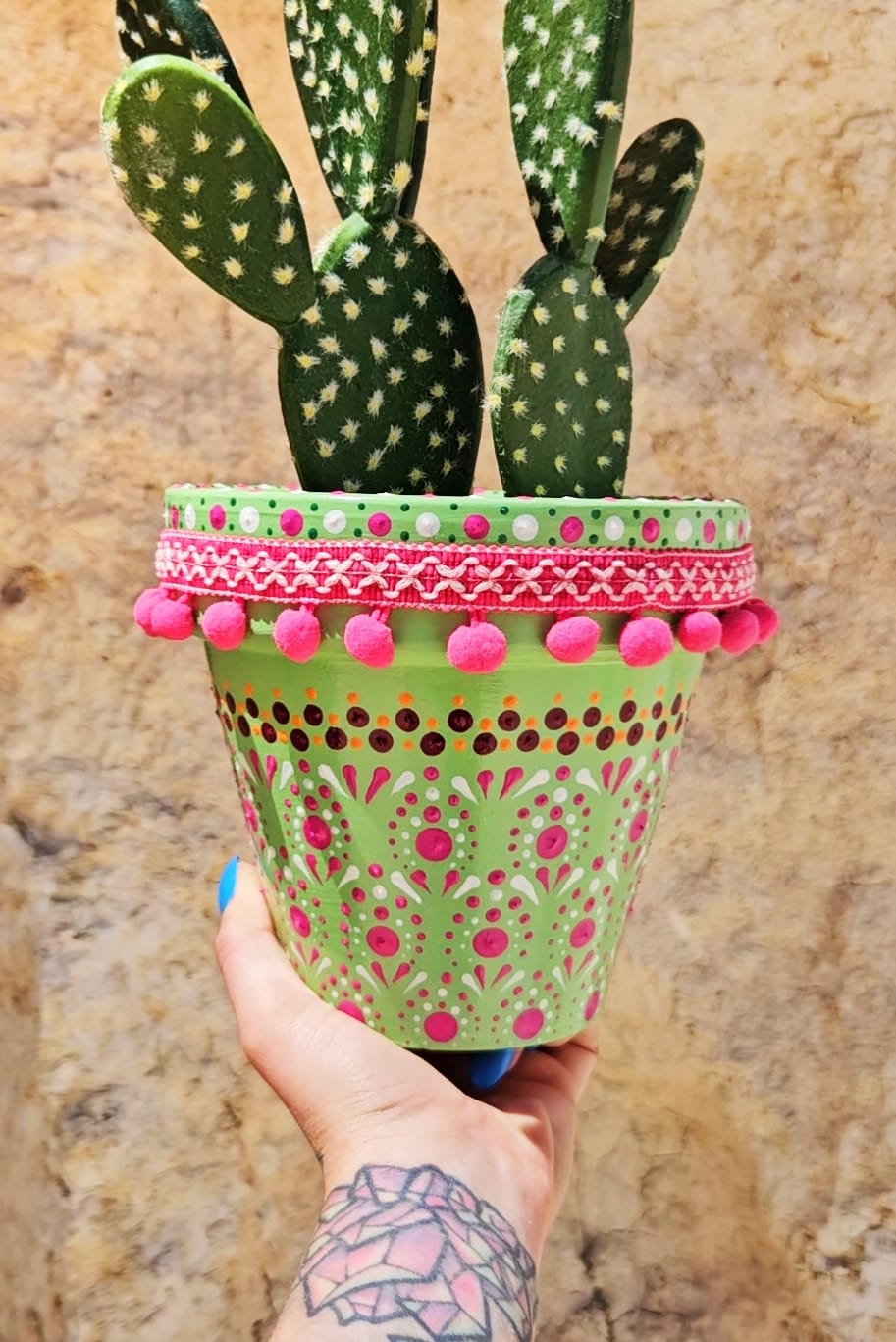Decorative dotted plant-pot.