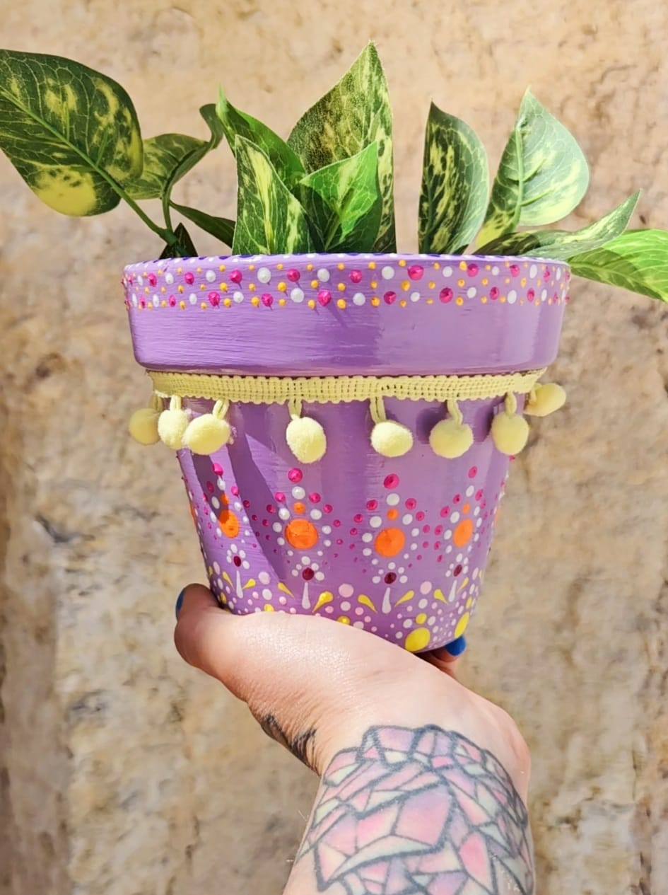 Decorative dotted plant-pot.