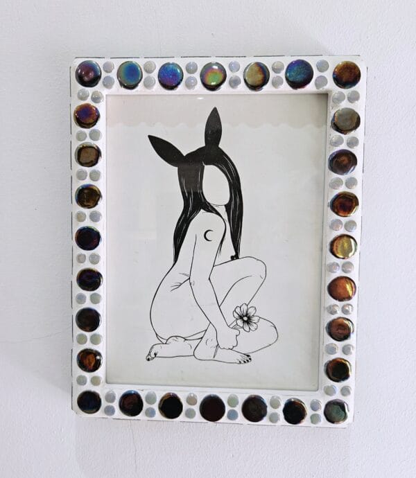 Iridescent mosaic photo-frame.