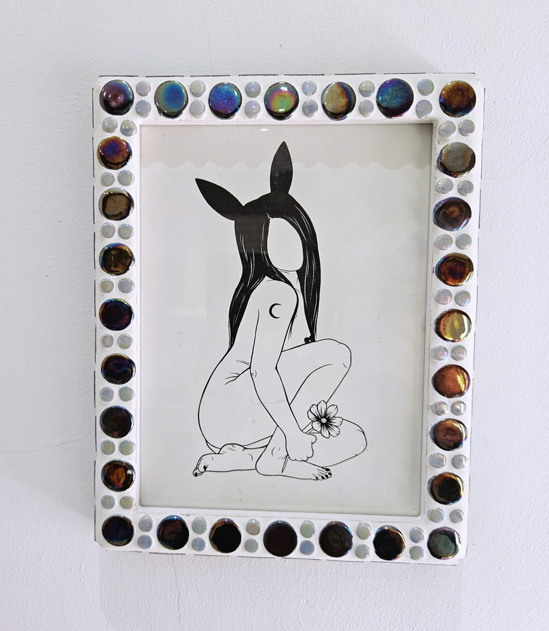 Iridescent mosaic photo-frame.