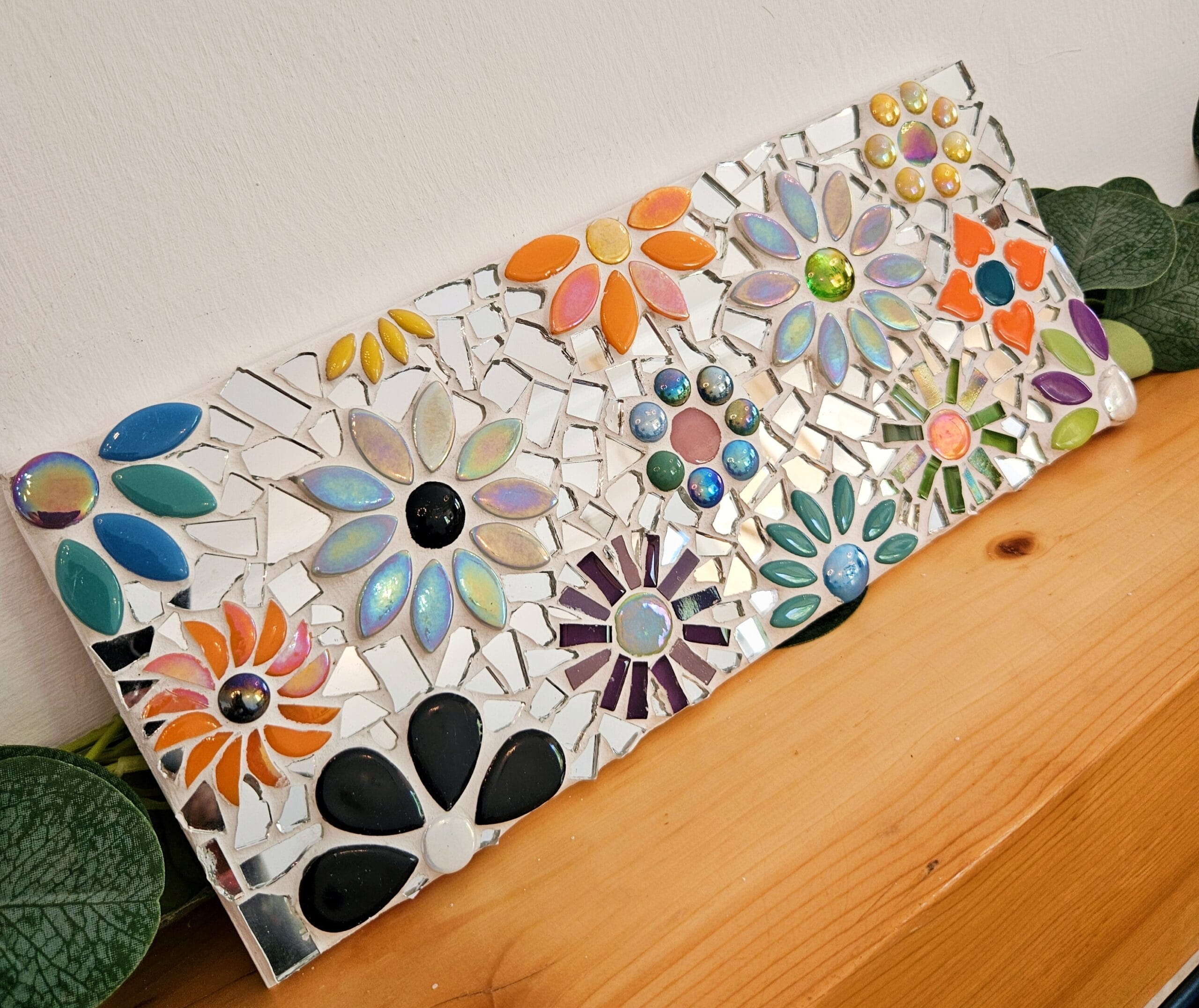 Mirrored mosaic flower tile.