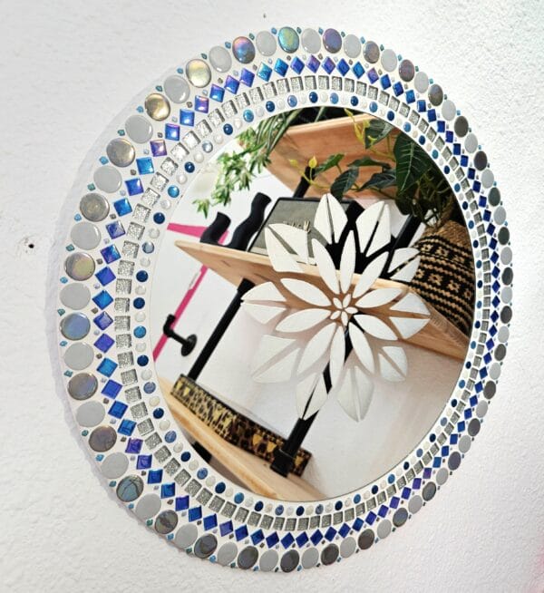 Blue and white mosaic mirror with etched mandala.