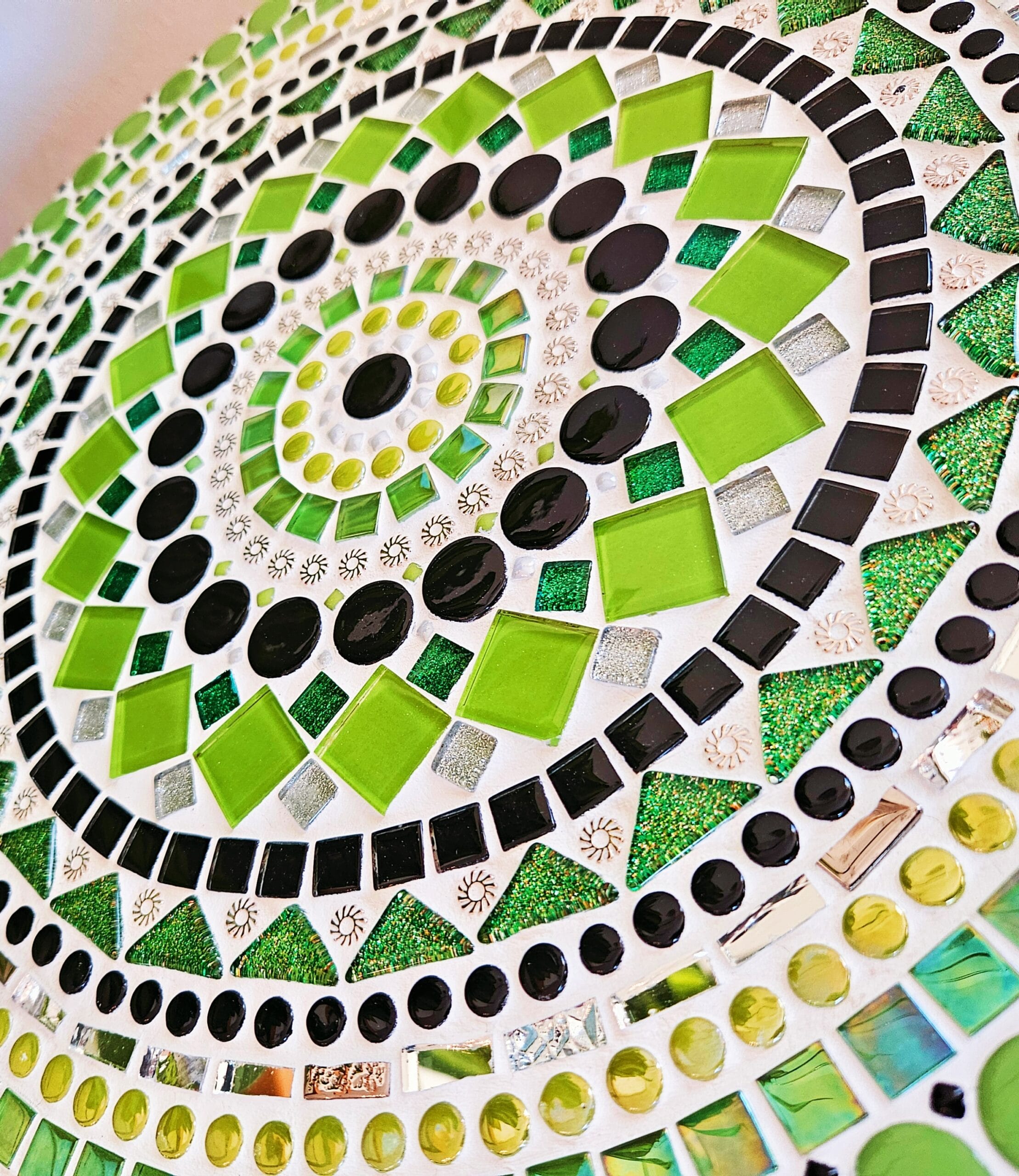 Close up of colourful mosaic table.