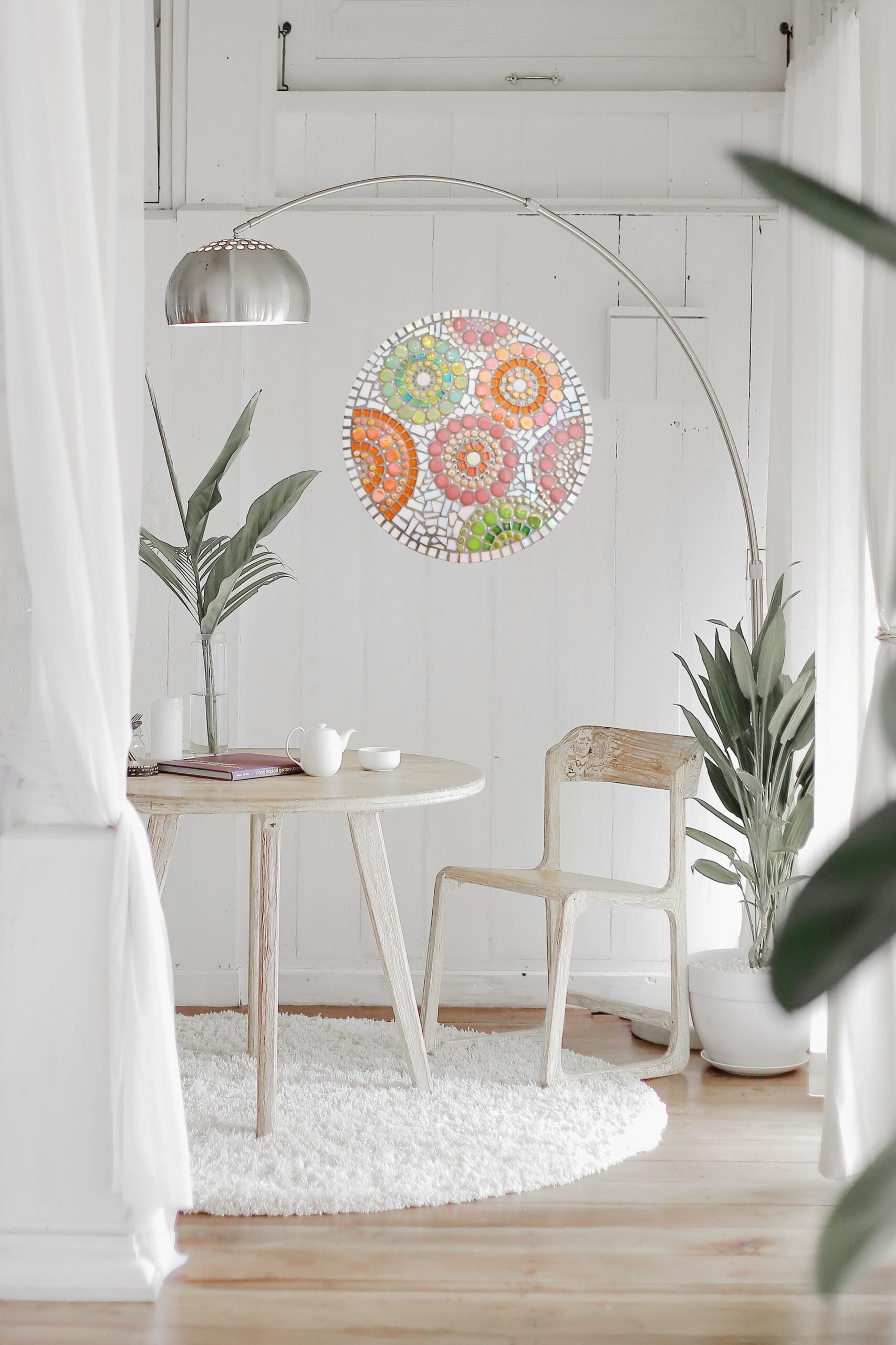 Bright, cozy, minimalist interior design with mosaic art.