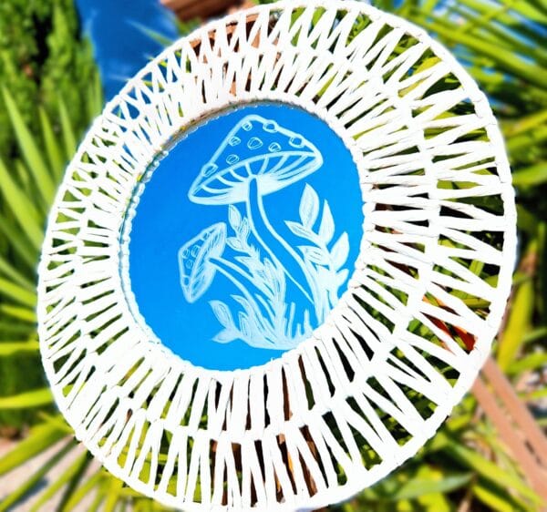 Etched mushroom mirror.