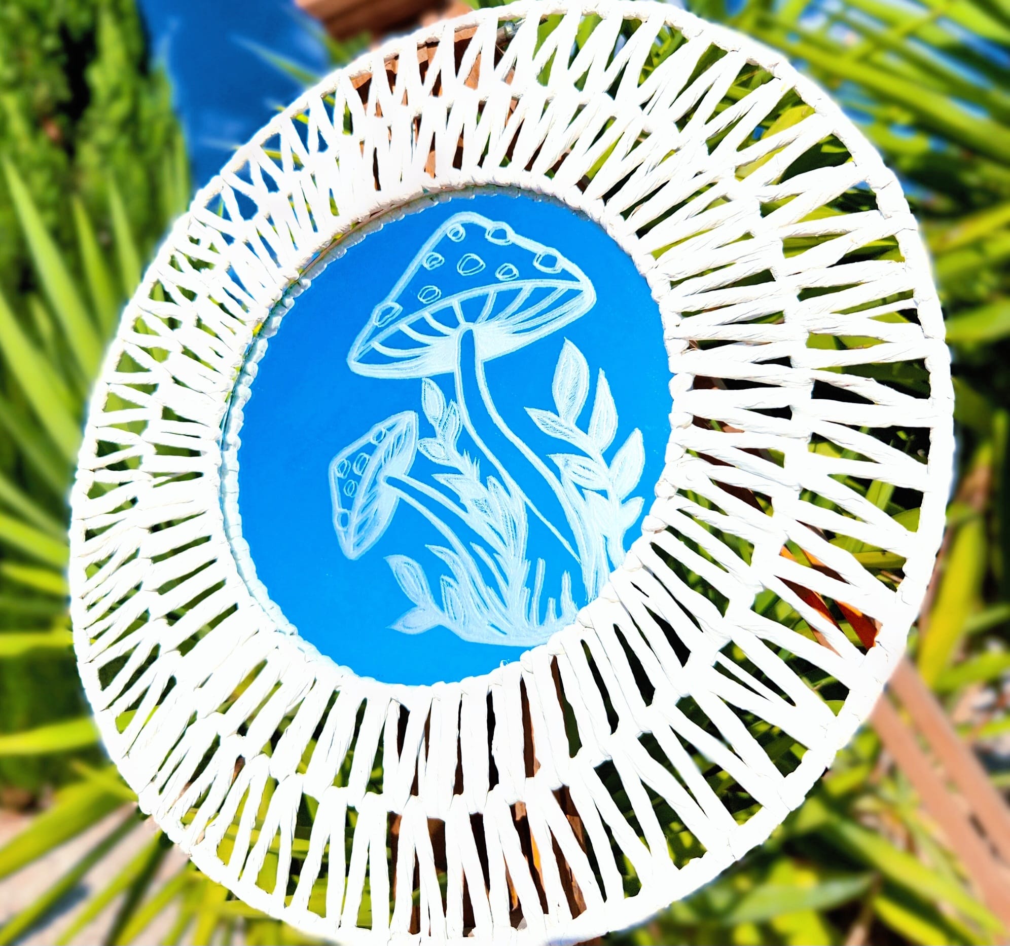 Etched mushroom mirror.