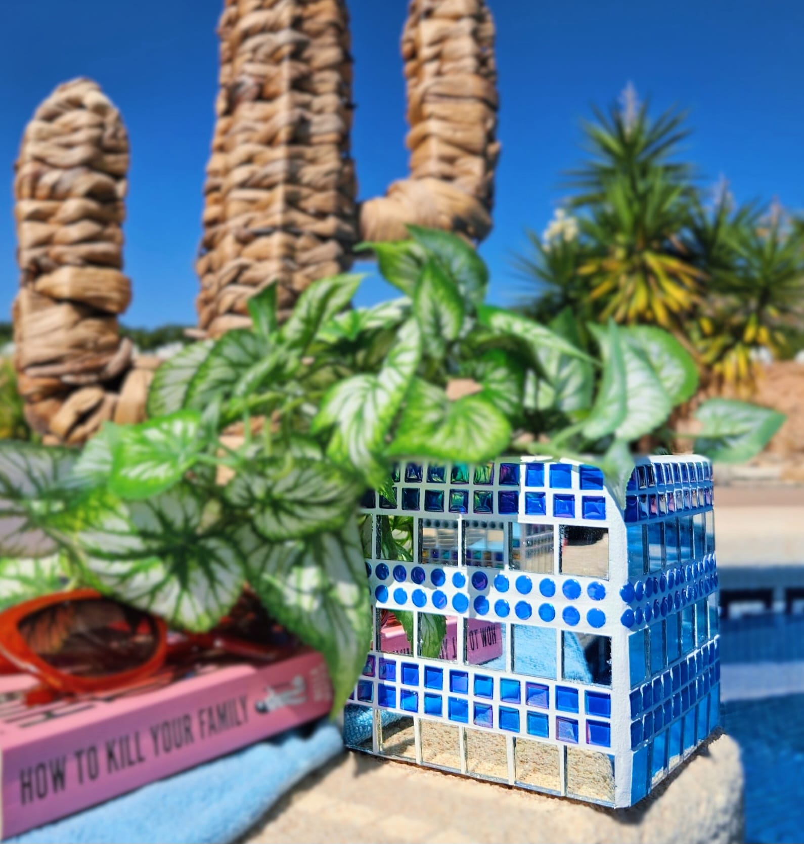 Blue mirrored decorative mosaic plant pot.