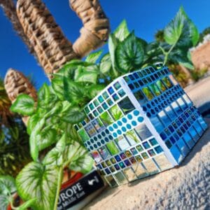 Turquoise decorative mosaic plant pot.