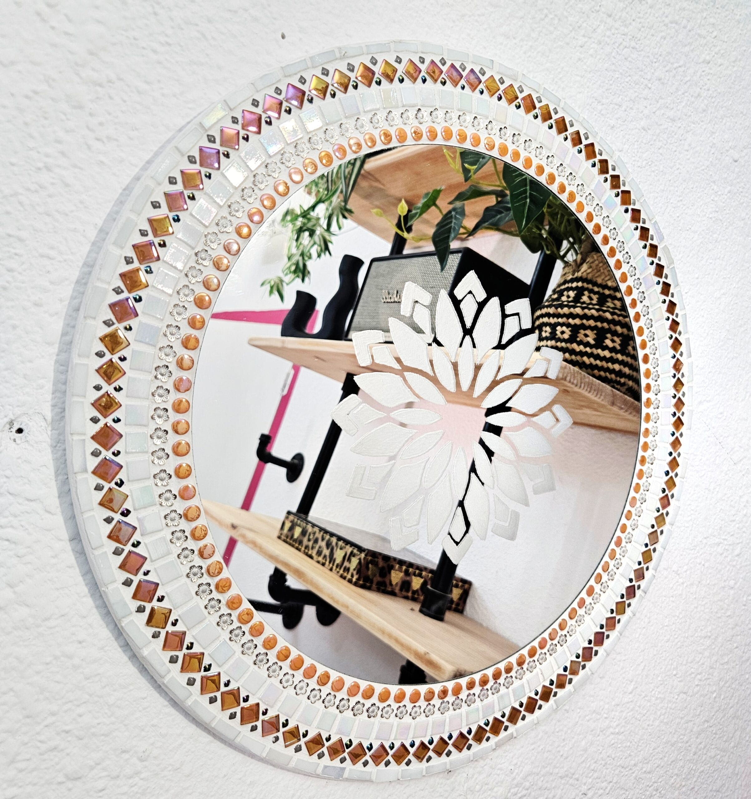 Mosaic mirror with etched mandala.